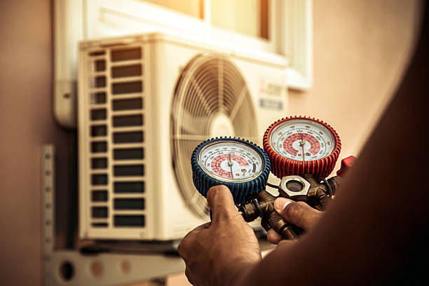 Professional Hvac Maintenance technician working in Newton Lower Falls, MA